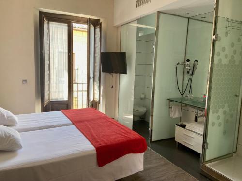 Foto de una habitación de Evenia Alcalá Boutique Hotel