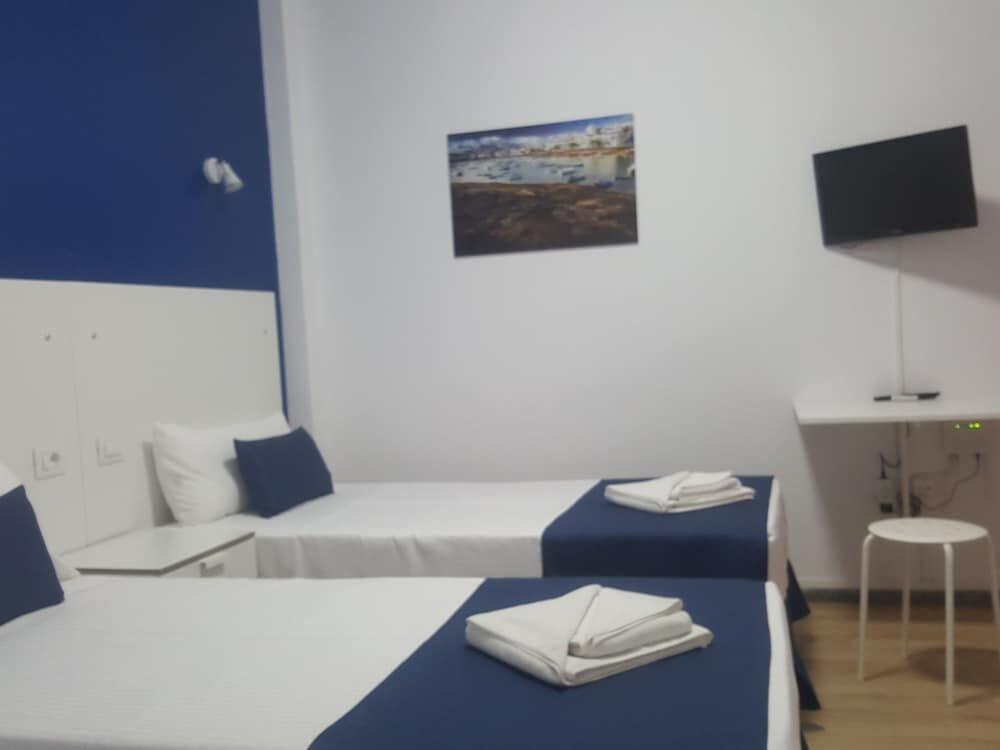 Foto de una habitación de Hostal San Gines