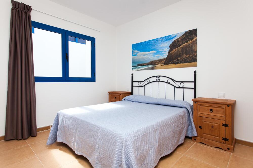 Foto de una habitación de Apartamentos TAO El Cotillo