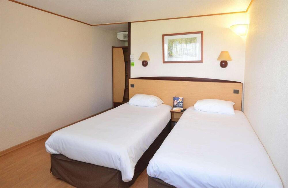 Foto de una habitación de Hotel Campanile Brive-La-Gaillarde Ouest