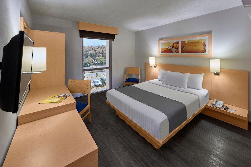 Foto de una habitación de Hotel City Express Tula