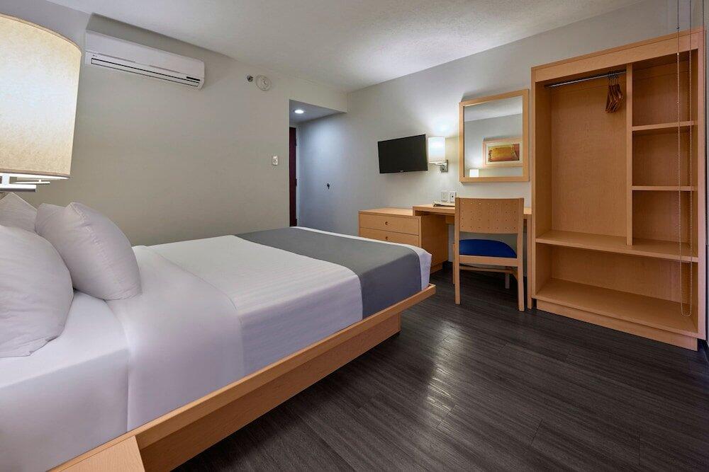 Foto de una habitación de Hotel City Express Tula
