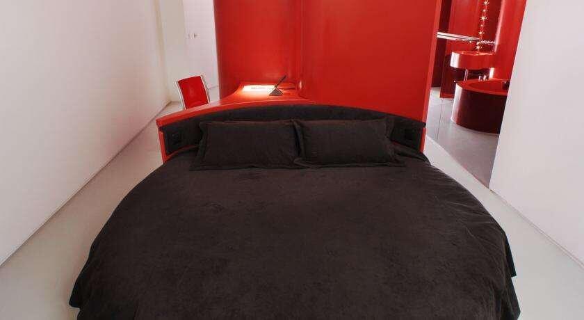Foto de una habitación de Hotel Puerta America