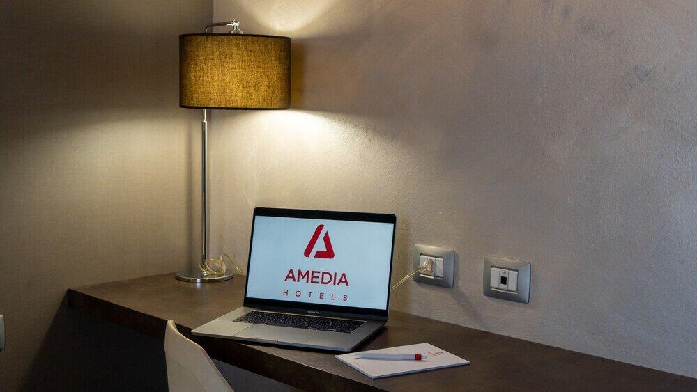 Foto de una habitación de AMEDIA Hotel Noventa