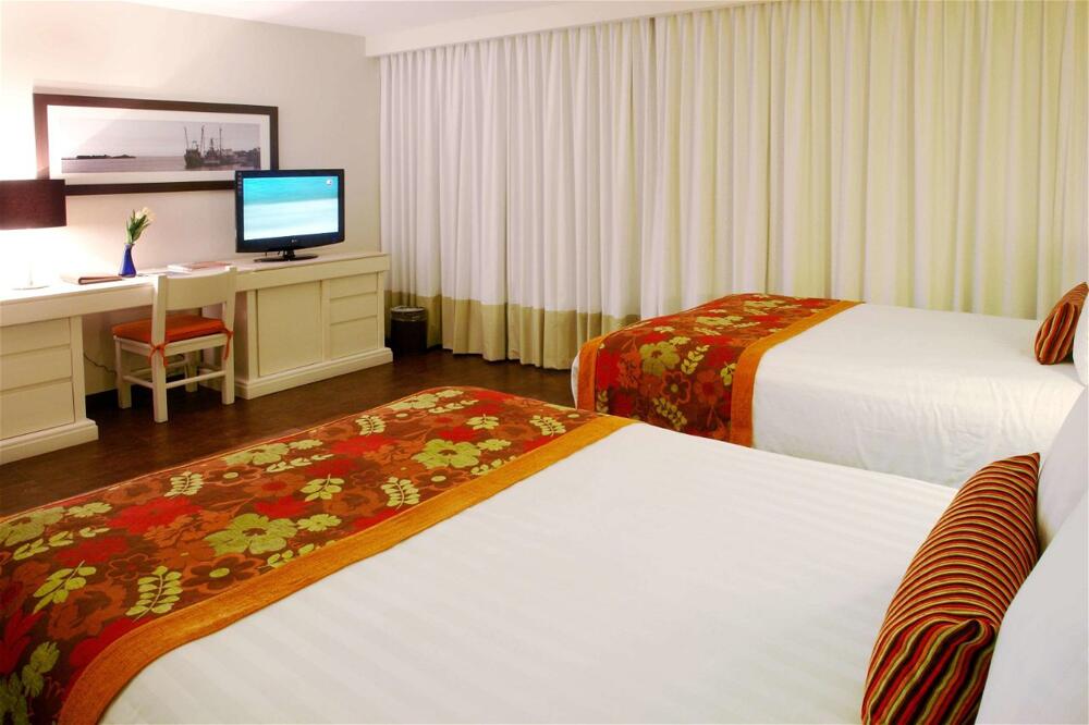 Foto de una habitación de Hotel Emporio Mazatlan
