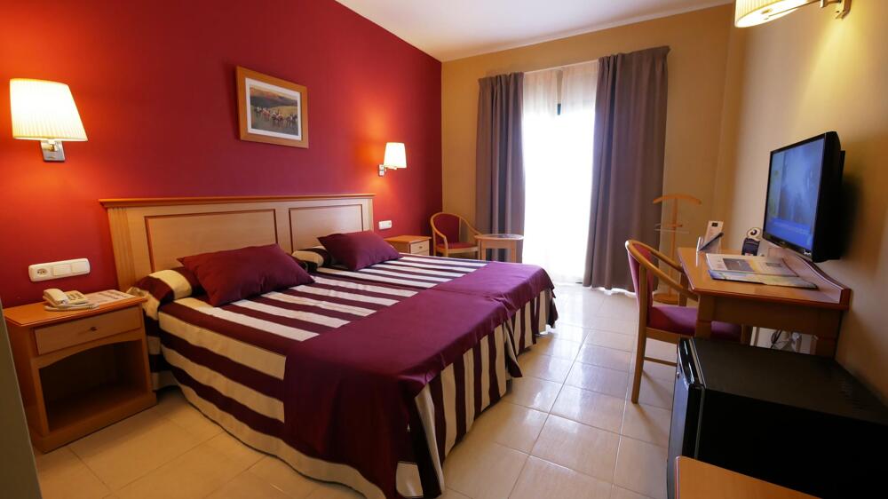 Foto de una habitación de Hotel Victoria Playa