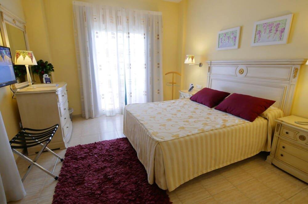 Foto de una habitación de Hotel Victoria Playa