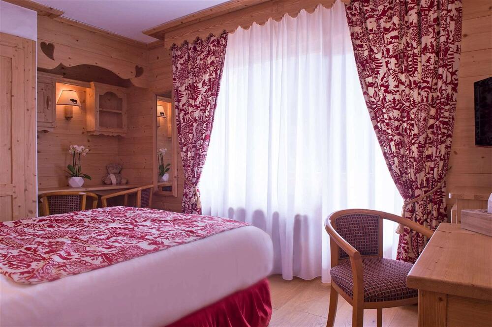 Foto de una habitación de Chalet-Hôtel Neige et Roc, The Originals Relais (Hotel-Chalet de Tradition)