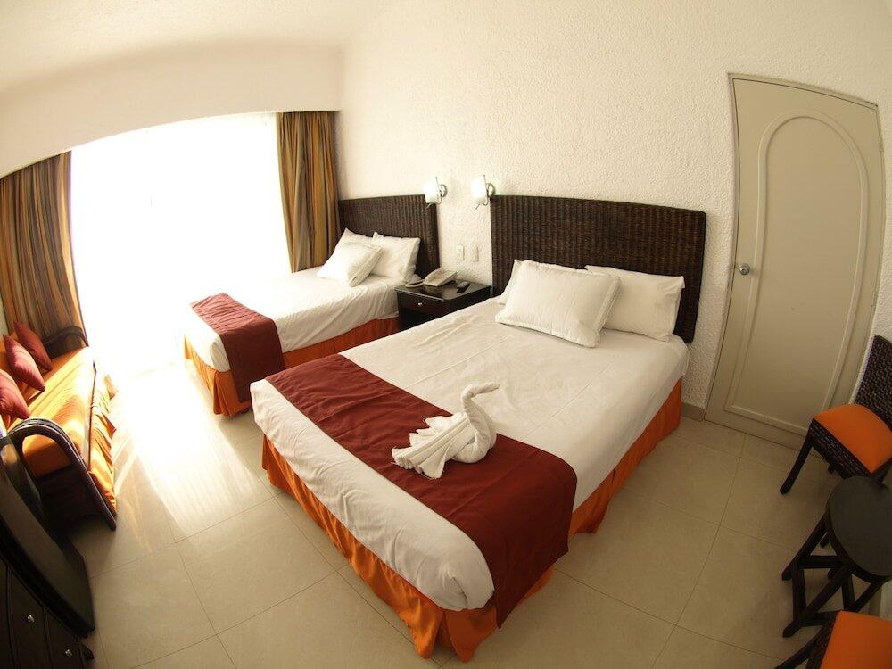 Foto de una habitación de Hotel Sierra Mar All Inclusive at Tesoro