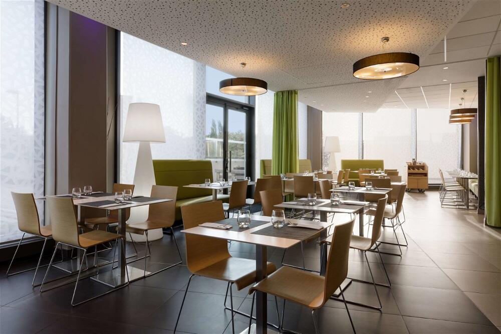 Foto de restauración de Hotel Park Inn by Radisson Lille Grand Stade