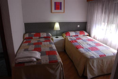 Foto de una habitación de Apartamentos Goya 75