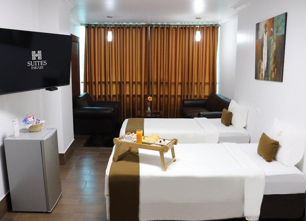 Foto de una habitación de Inkari Suites Hotel