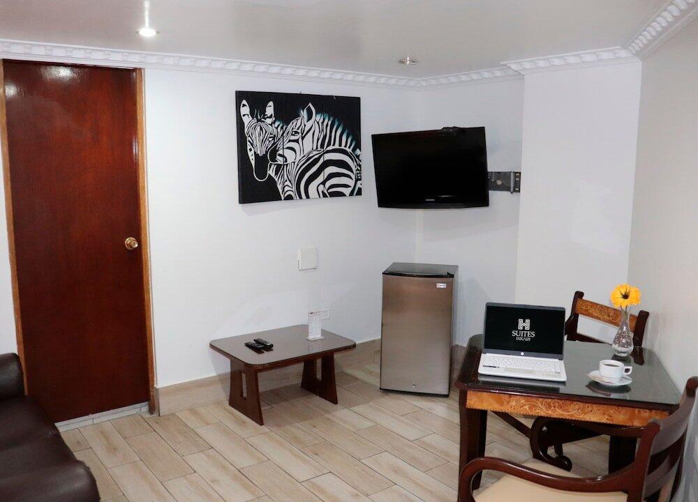 Foto de una habitación de Inkari Suites Hotel