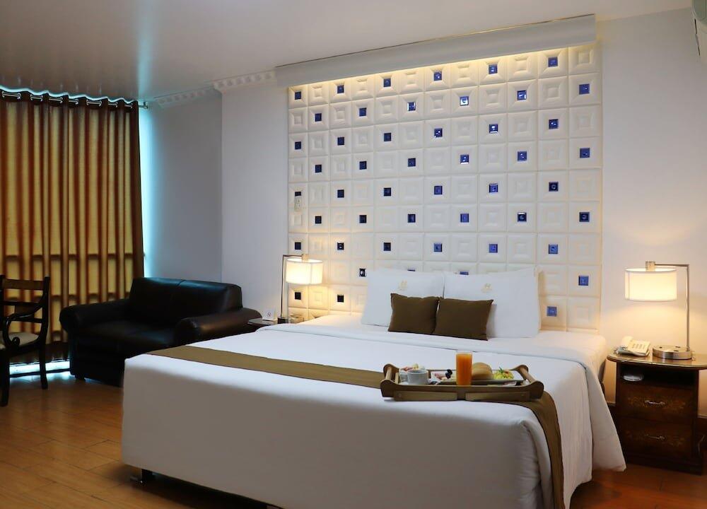 Foto de una habitación de Inkari Suites Hotel