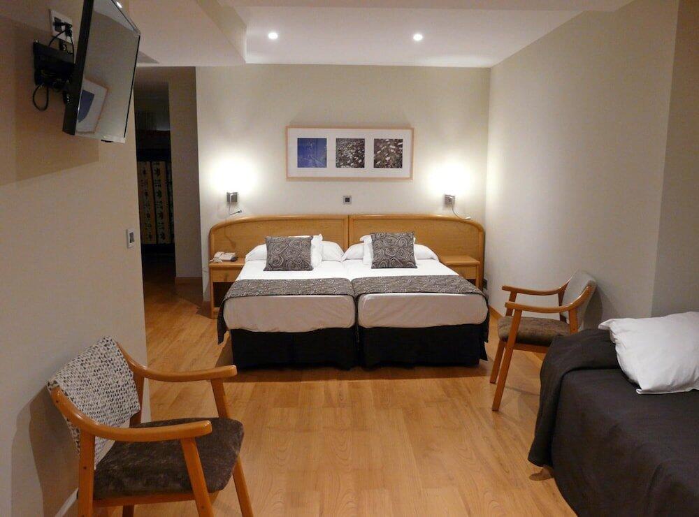 Foto de una habitación de Hotel Tanit