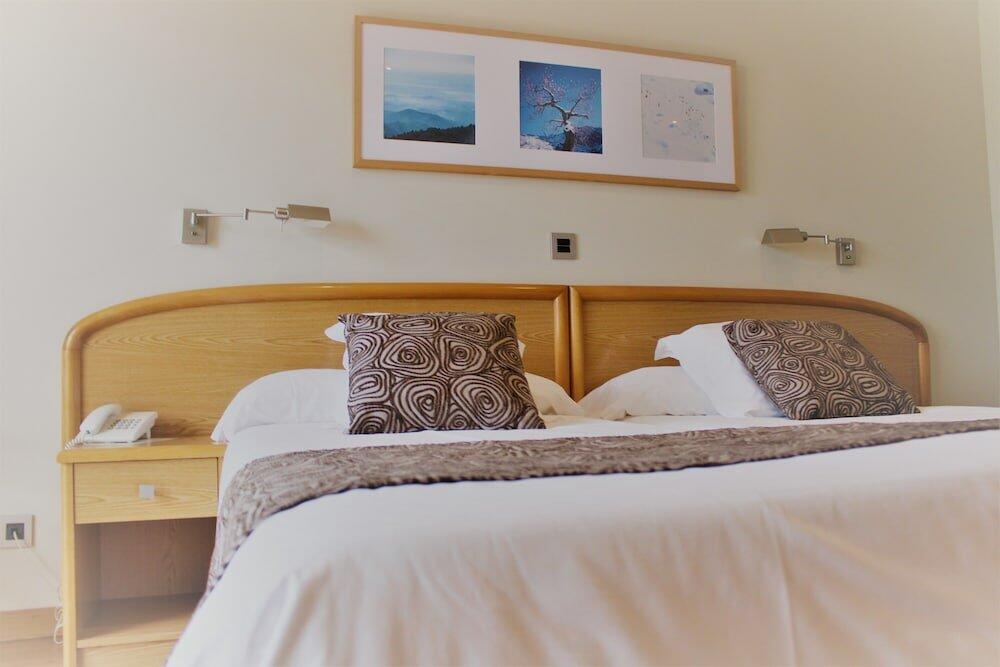 Foto de una habitación de Hotel Tanit