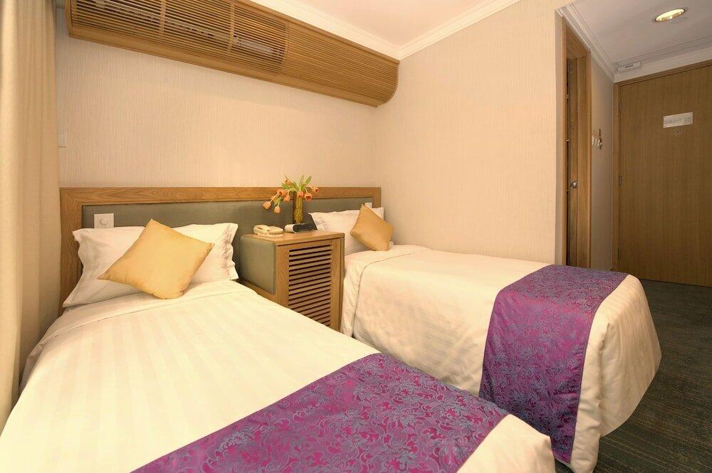 Foto de una habitación de Hotel Bishop Lei International House