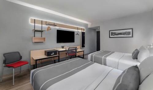 Foto de una habitación de Hotel City Express Plus Insurgentes Sur