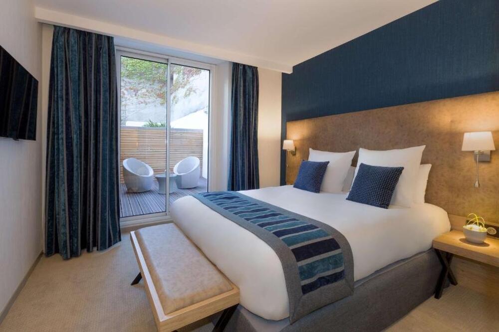 Foto de una habitación de Hôtel Le Rive Droite &amp;amp; SPA