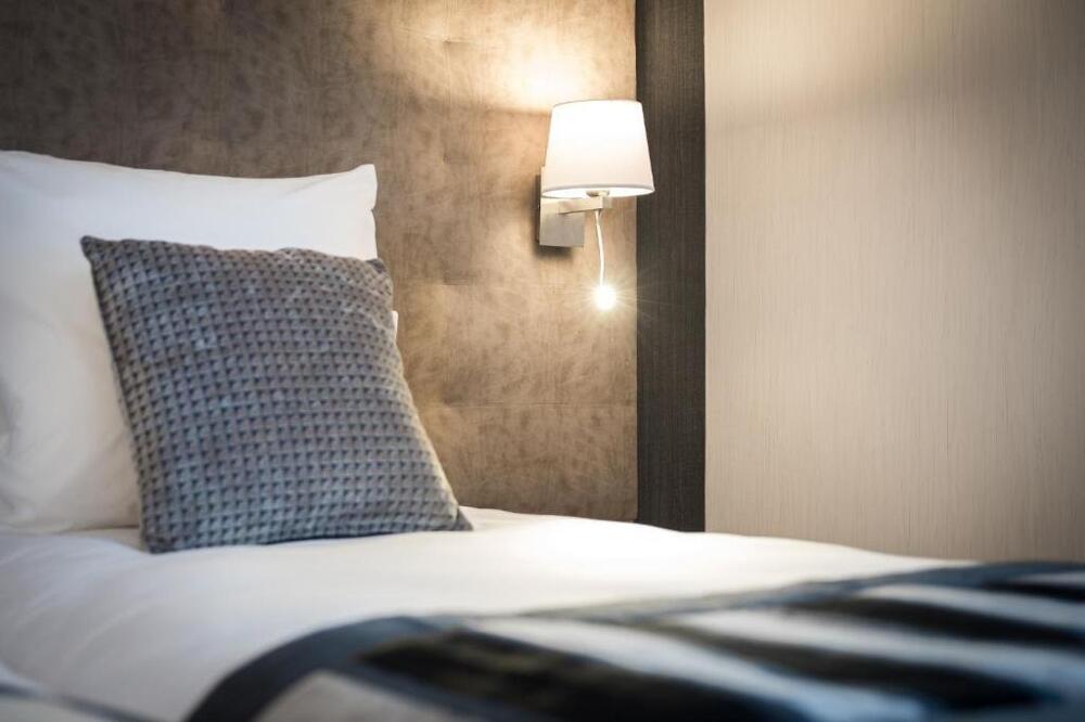 Foto de una habitación de Hôtel Le Rive Droite &amp;amp; SPA