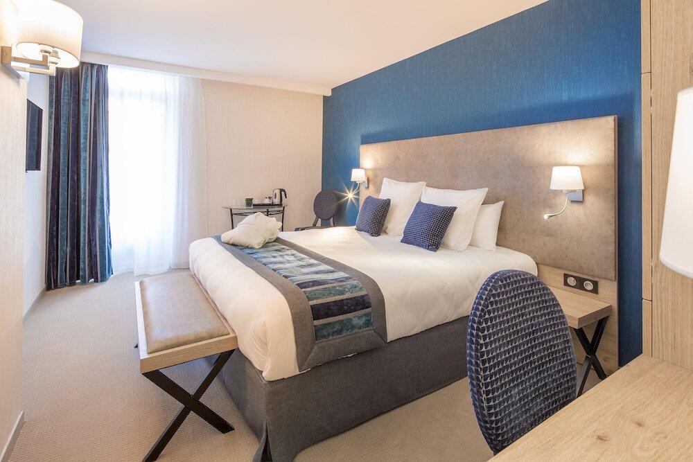 Foto de una habitación de Hôtel Le Rive Droite &amp;amp; SPA