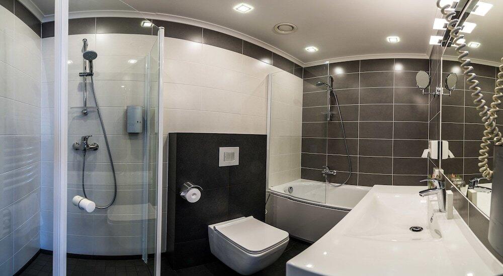Foto del baño de Amrita Hotel
