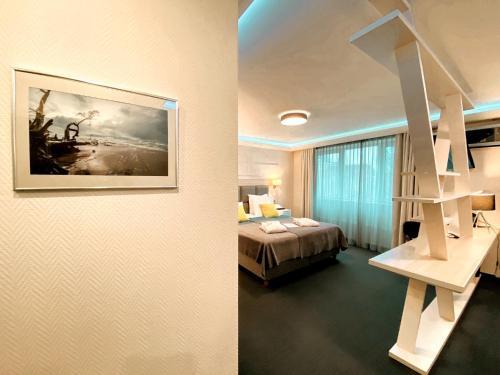 Foto de una habitación de Amrita Hotel