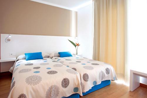 Foto de una habitación de Apartamentos Bellamar