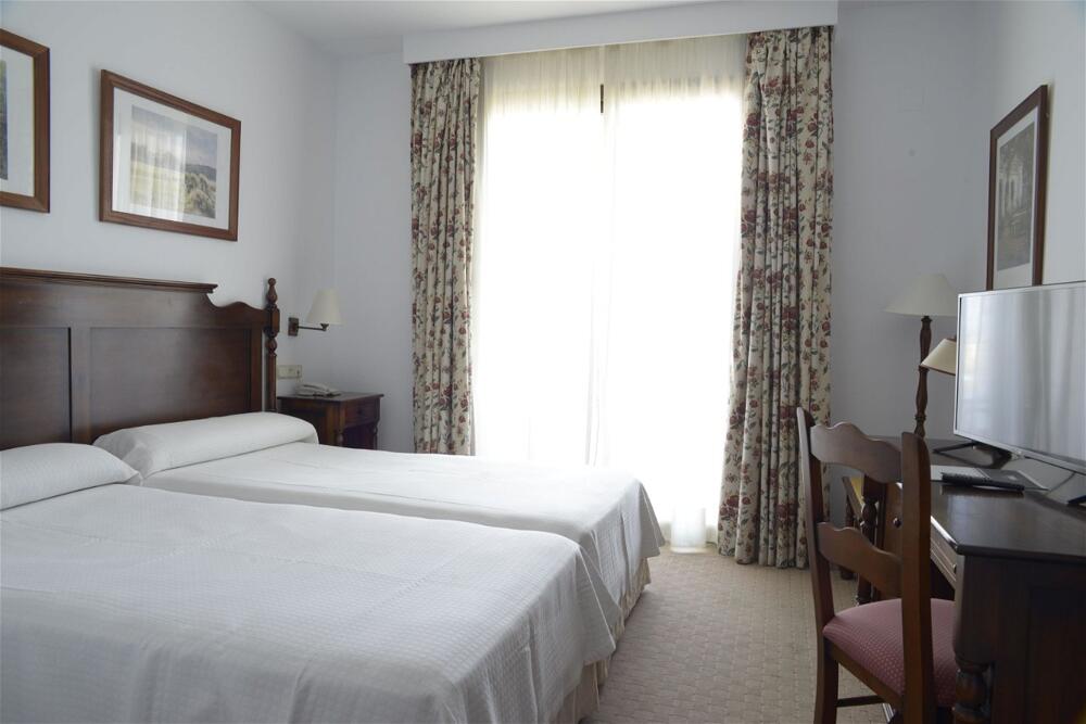 Foto de una habitación de Hotel TRH Mijas