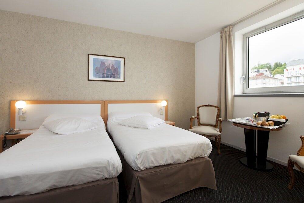 Foto de una habitación de Hôtel Paradis