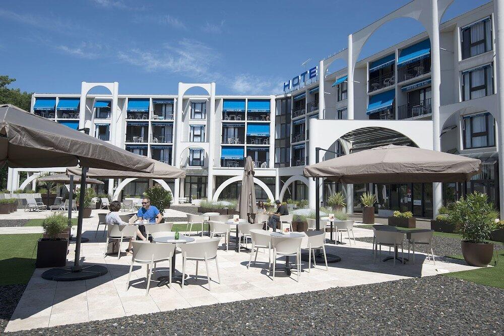 Foto de las zonas nobles de Brit Hotel du Lac