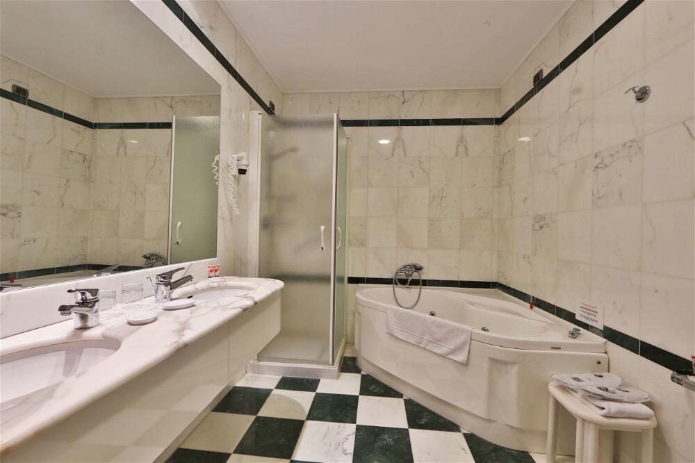 Foto del baño de Best Western Grand Hotel Guinigi
