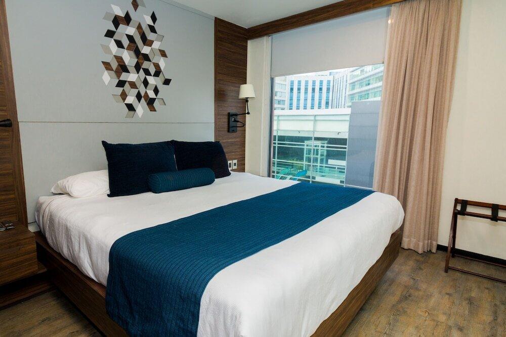 Foto de una habitación de Aparthotel FlowSuites WTC