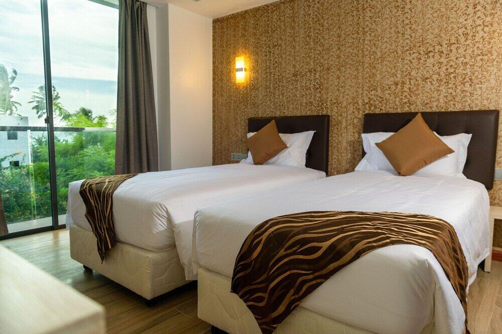 Foto de una habitación de Ari Grand Hotel &amp;amp; Spa