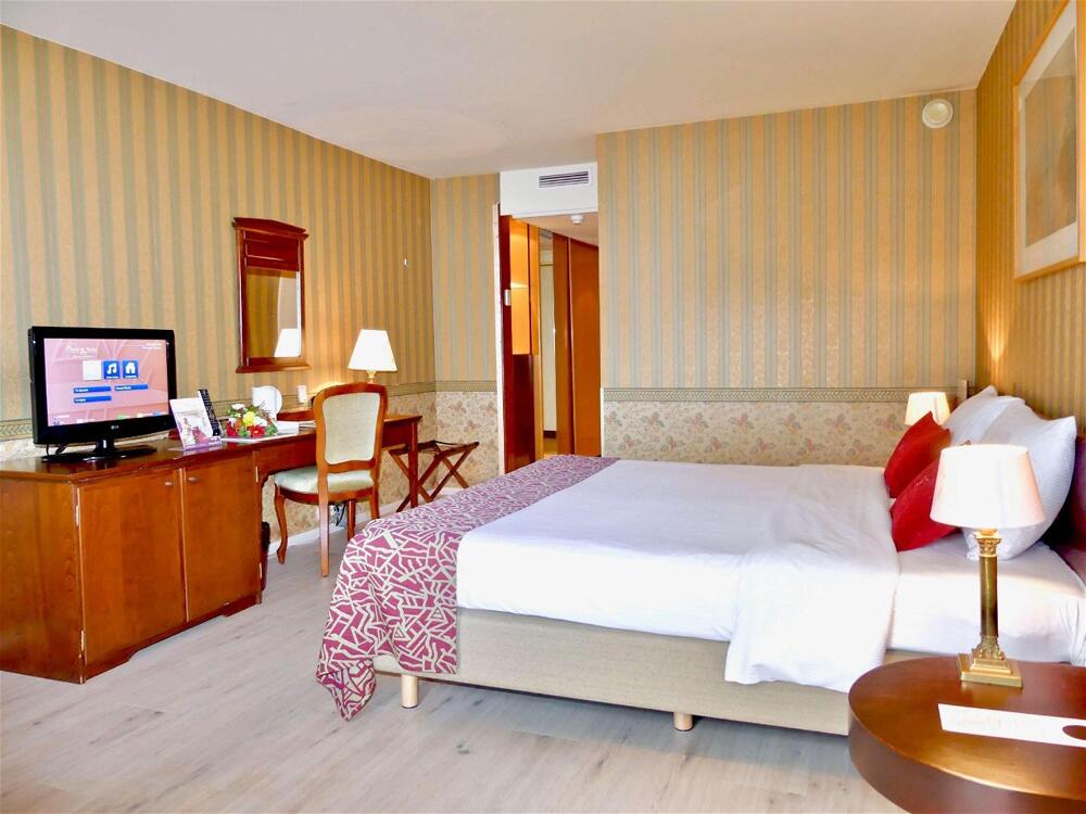 Foto de una habitación de Golden Tulip De&amp;#039; Medici Hotel