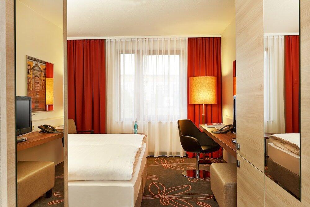 Foto de una habitación de H+ Hotel Hannover