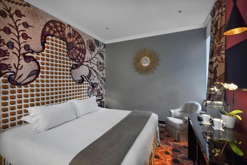 Foto de una habitación de Hôtel &amp;amp; Spa Jules César Arles - MGallery Hotel Collection