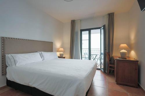 Foto de una habitación de Hotel Tugasa Sierra y Cal