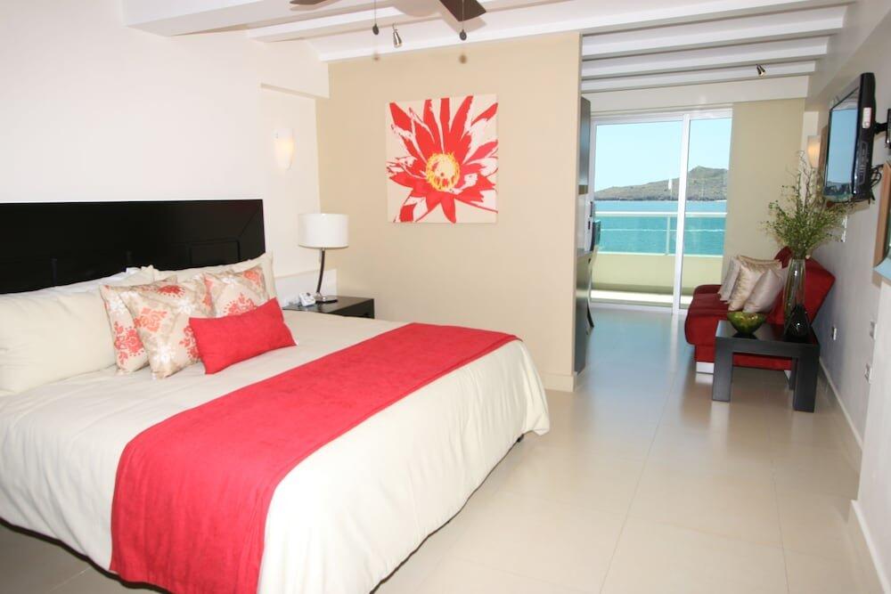 Foto de una habitación de Hotel Las Flores Beach Resort
