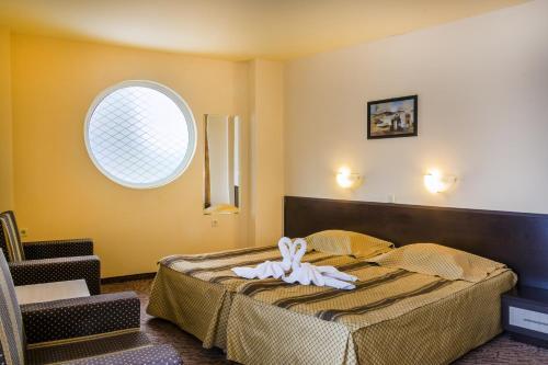 Foto de una habitación de Amaris Hotel