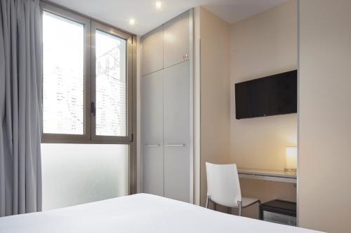 Foto de una habitación de Welcome Gros Hotel