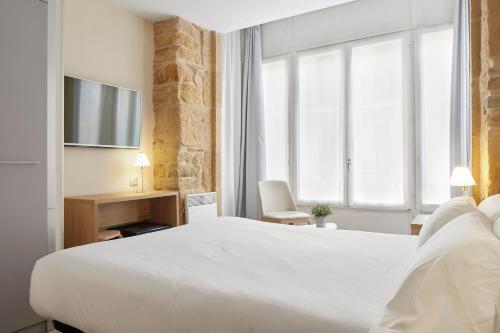 Foto de una habitación de Welcome Gros Hotel