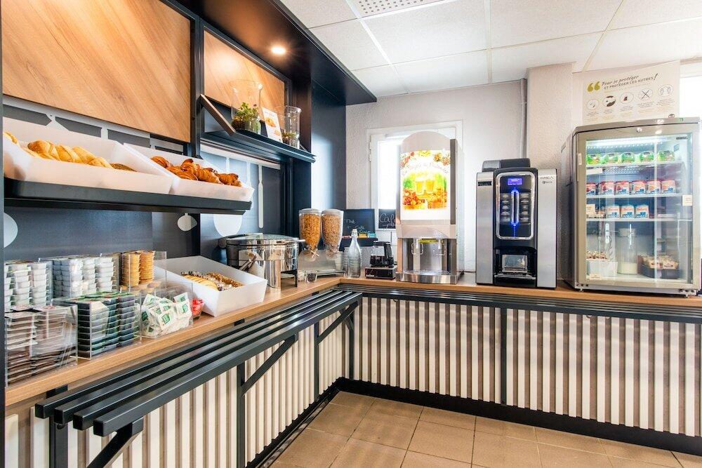 Foto de restauración de Hotel Première Classe Cholet