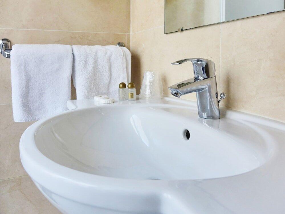 Foto del baño de Hotel Touring