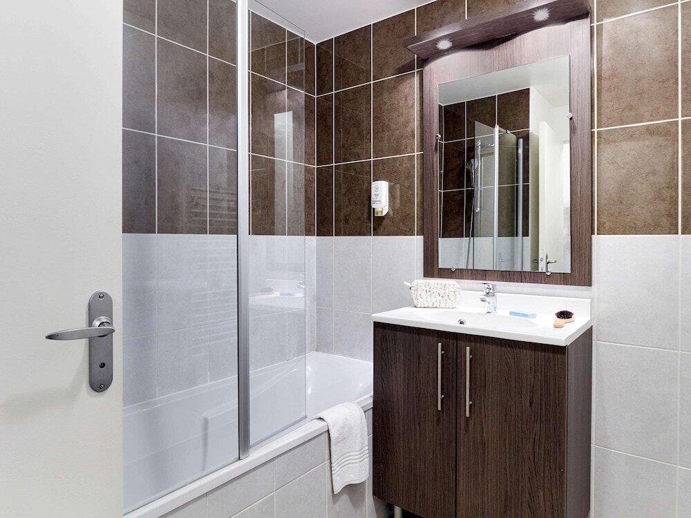 Foto del baño de Aparthotel Adagio Access Poitiers