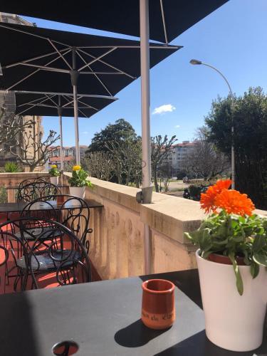 Foto de restauración de Hôtel &amp;amp; Espace Bien-être La Maison du Lierre