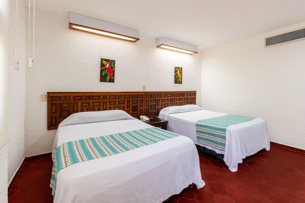 Foto de una habitación de Hotel Margaritas