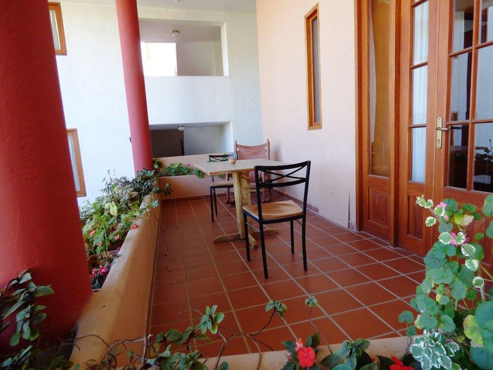 Foto de una habitación de Hotel Villa Antigua