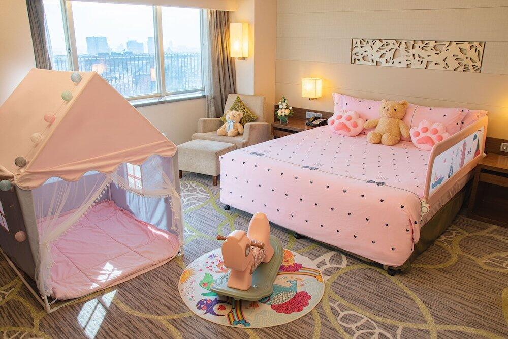 Foto de una habitación de Crowne Plaza Guangzhou City Centre, an IHG Hotel