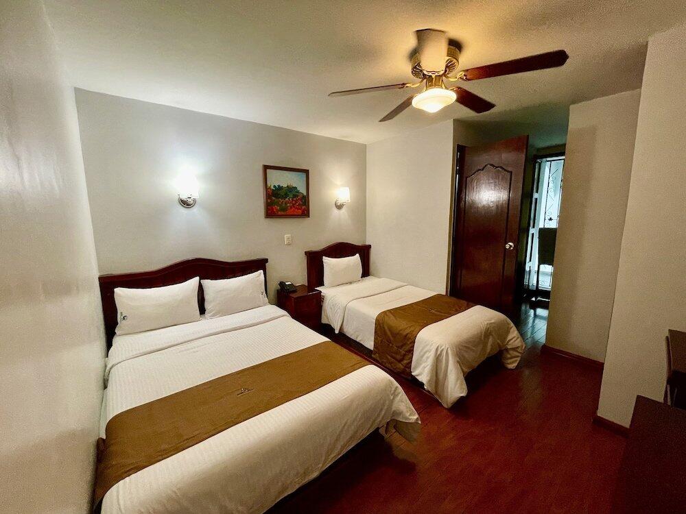 Foto de una habitación de Hotel Puebla Plaza
